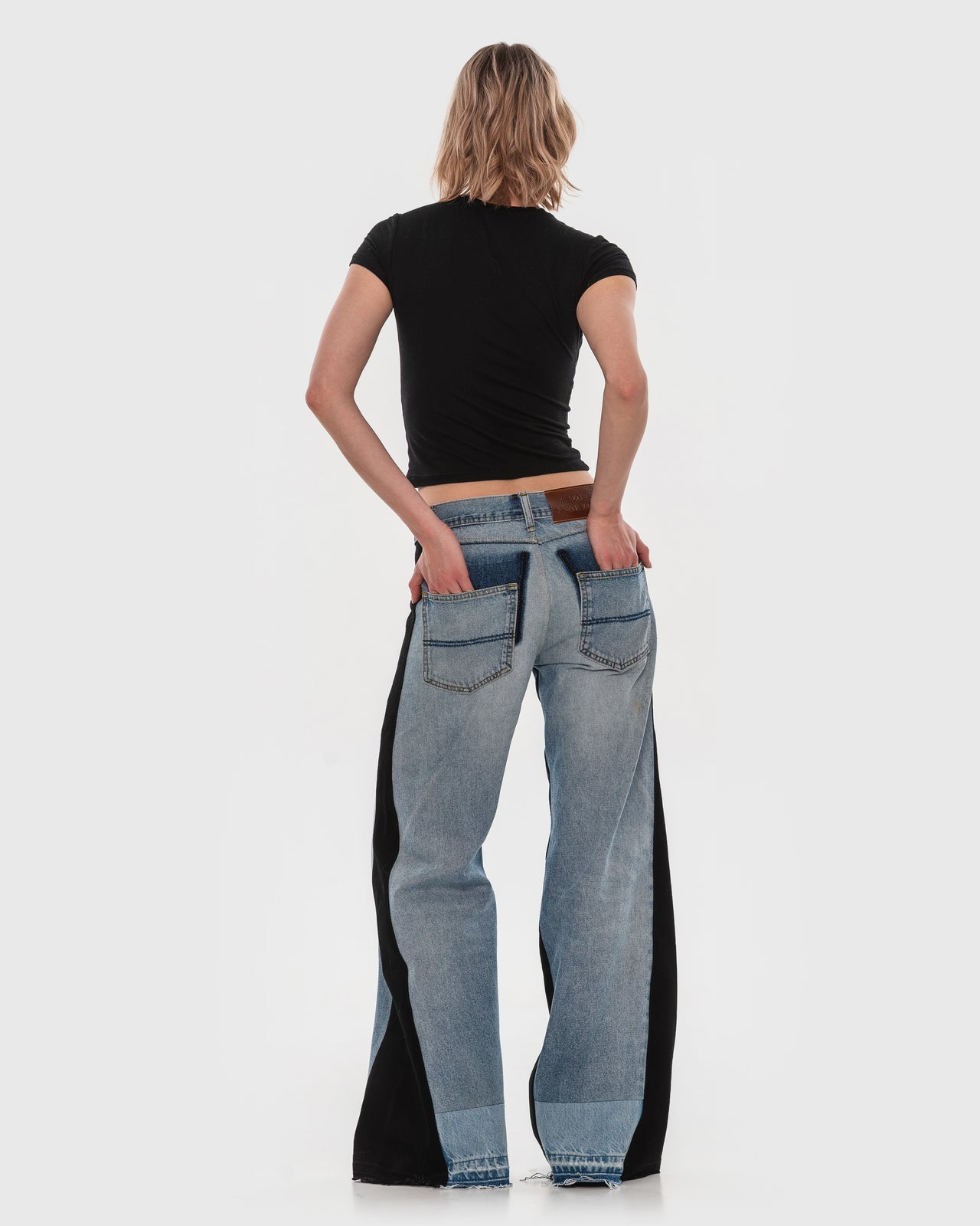 Buy Wide Jeans with Wide Contrast Side Lines – Bottoms by Ksenia Schnaider | Ethical & Sustainable Fashion