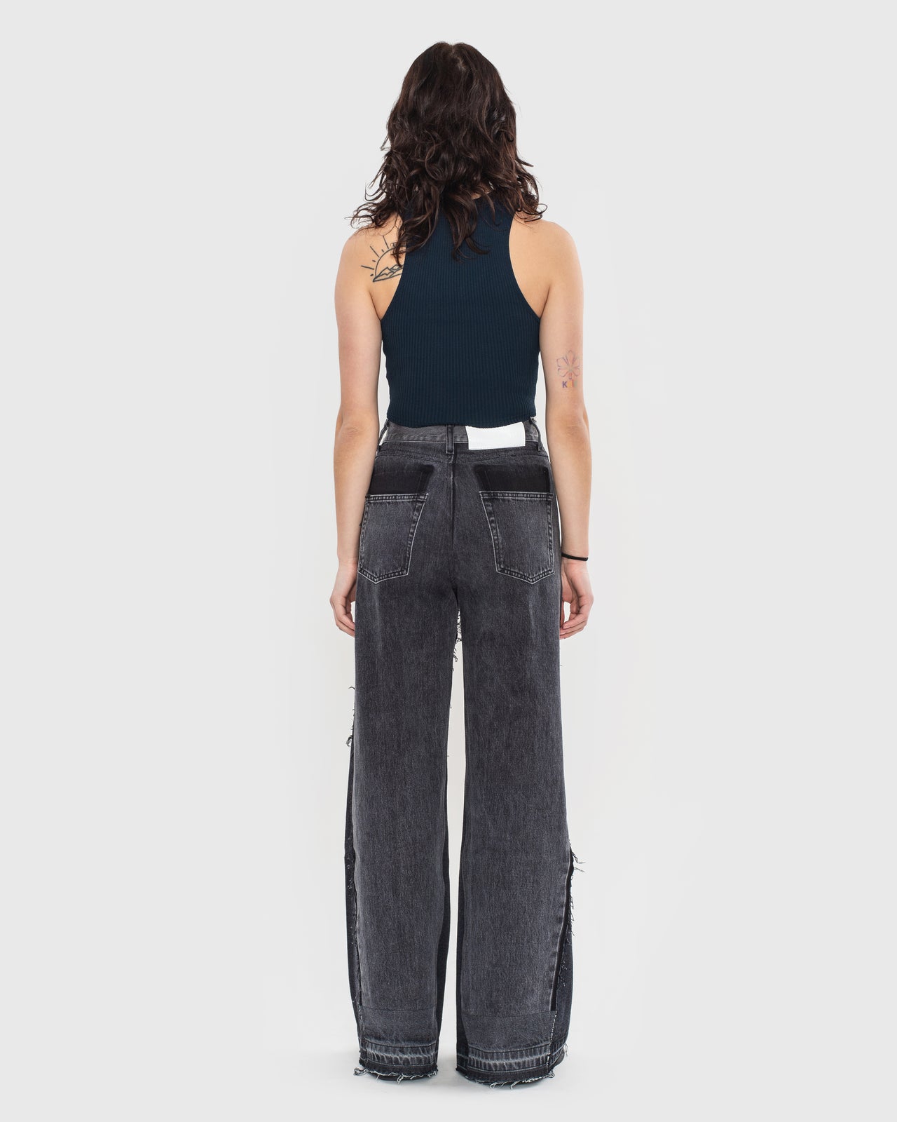 Buy Reworked Patchwork Wide Jeans – Bottoms by Ksenia Schnaider | Ethical & Sustainable Fashion