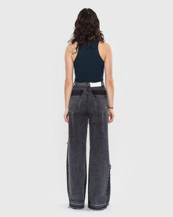 Buy Reworked Patchwork Wide Jeans – Bottoms by Ksenia Schnaider | Ethical & Sustainable Fashion
