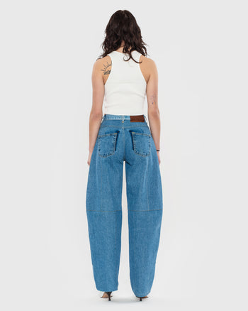 Buy Reworked Fortune Cookie Jeans – Bottoms by Ksenia Schnaider | Ethical & Sustainable Fashion