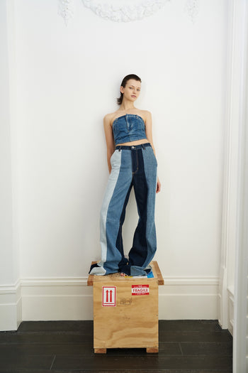 Buy Reworked Striped Flared Jeans – Bottoms by Ksenia Schnaider | Ethical & Sustainable Fashion