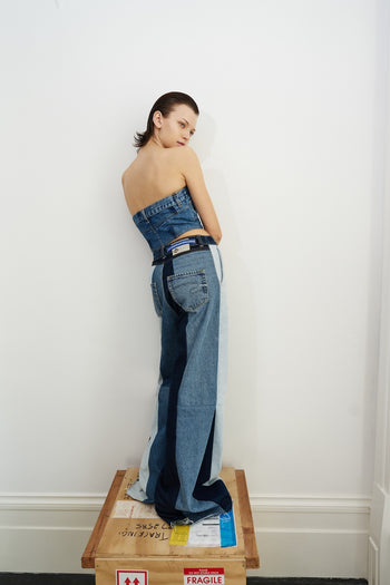 Buy Reworked Striped Flared Jeans – Bottoms by Ksenia Schnaider | Ethical & Sustainable Fashion