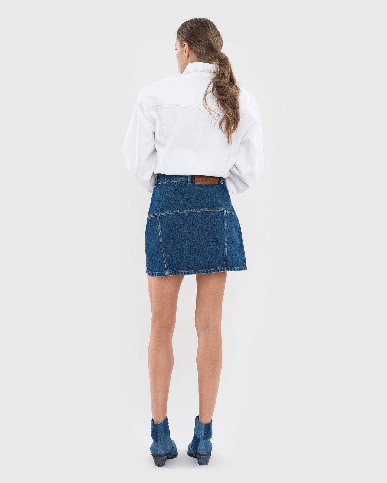 Buy Facing Denim Mini Skirt – Bottoms by Ksenia Schnaider | Ethical & Sustainable Fashion