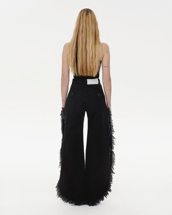 Buy Wide Fringed Jeans – Bottoms by Ksenia Schnaider | Ethical & Sustainable Fashion